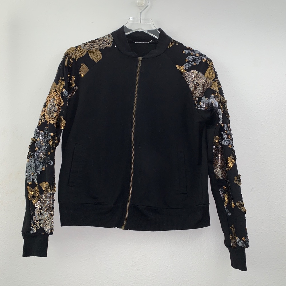 CODI black Jacquet with sequin designed sleeves.